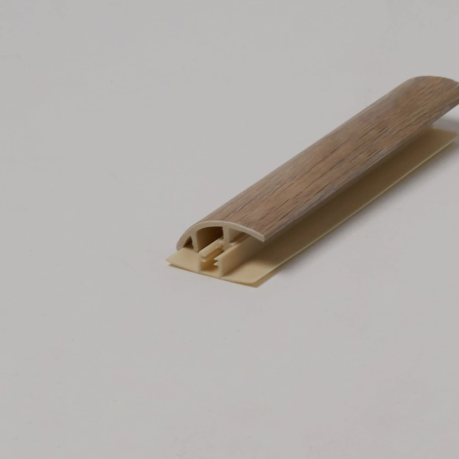 SMARTCORE Woodford Oak 1.42-in X 94.49-in Vinyl Floor Reducer 1 SMARTCORE Woodford Oak 1.42-in X 94.49-in Vinyl Floor Reducer